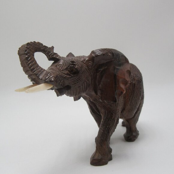 Vintage raised trunk resin elephant with tusks - brown textured faux wood - 3" - Picture 2 of 11